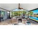 Enjoy outdoor living on the lanai, offering great lake views at 613 Fort Duquesna Dr, Sun City Center, FL 33573
