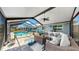 Entertain guests on the lanai with pool views and comfy seating at 613 Fort Duquesna Dr, Sun City Center, FL 33573
