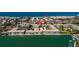 An aerial view of the condos, pier, and beach with water views in a lovely area at 6161 Gulf Winds Dr # 338, St Pete Beach, FL 33706
