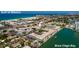 Breathtaking aerial view showcasing waterfront living with direct access to Boca Ciega Bay and the Gulf of Mexico at 6161 Gulf Winds Dr # 338, St Pete Beach, FL 33706