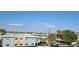 Aerial view showing location of Boca Ciega Bay and the community pool at 6161 Gulf Winds Dr # 338, St Pete Beach, FL 33706