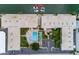 Aerial view showcases the community pool, parking, waterway access and outdoor gathering spaces at 6161 Gulf Winds Dr # 338, St Pete Beach, FL 33706