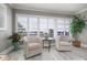 Bright living room with shuttered windows, comfortable seating, and a serene atmosphere at 6161 Gulf Winds Dr # 338, St Pete Beach, FL 33706