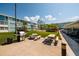 Inviting community area features grilling area, picnic tables, and lush landscaping at 6161 Gulf Winds Dr # 338, St Pete Beach, FL 33706