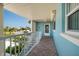 Exterior porch of a unit with access to an exterior staircase and water views at 6161 Gulf Winds Dr # 338, St Pete Beach, FL 33706