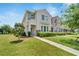 Charming two-story townhome with manicured lawn and landscaping at 6325 Shore Vista Pl, Apollo Beach, FL 33572