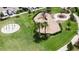 Community playground with slide, water feature, and grassy area perfect for Gathering fun at 6325 Shore Vista Pl, Apollo Beach, FL 33572