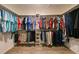 Walk-in closet features rods and shelving at 6416 Cobble Bliss St, Zephyrhills, FL 33541