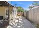Enclosed backyard featuring a concrete pad and wood fencing at 6936 77Th N Ter, Pinellas Park, FL 33781
