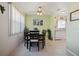 Inviting dining room with seating for six and plenty of natural light at 6936 77Th N Ter, Pinellas Park, FL 33781