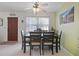Bright dining room featuring a large window and a rustic decor at 6936 77Th N Ter, Pinellas Park, FL 33781
