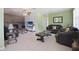 Spacious living room boasting a decorative fireplace and comfortable seating area at 6936 77Th N Ter, Pinellas Park, FL 33781