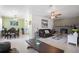 Open-concept living area connects living room and dining area at 6936 77Th N Ter, Pinellas Park, FL 33781