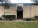 Charming condo with a private entrance and well-maintained landscaping in a desirable location at 7507 Presley Pl # D, Tampa, FL 33617