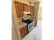 Updated kitchen featuring stainless steel range and ample cabinet space with stylish hardware at 7507 Presley Pl # D, Tampa, FL 33617