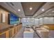 Relaxing lounge area with large TV screen, modern seating, and stylish decor at 777 N Ashley Dr # 1516, Tampa, FL 33602
