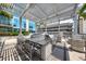 Outdoor kitchen and bar area with a grill and seating at 777 N Ashley Dr # 1516, Tampa, FL 33602