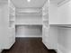 Well-organized walk-in closet with custom shelving and ample storage space at 806 W Adalee St, Tampa, FL 33603