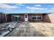 Spacious backyard with concrete patio, perfect for outdoor entertaining and relaxation at 8325 Elkwood Ln, Tampa, FL 33615