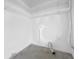 Unfinished basement utility hook ups; offering potential for storage or customization at 8325 Elkwood Ln, Tampa, FL 33615