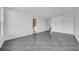 Bedroom with tiled floor, and multiple doorways at 8325 Elkwood Ln, Tampa, FL 33615