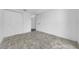 Bedroom with tiled floor, double closet and doorway at 8325 Elkwood Ln, Tampa, FL 33615