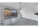 Bright dining area with sliding glass doors leading to the outdoor space at 8325 Elkwood Ln, Tampa, FL 33615