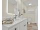 Bathroom features white cabinets, modern fixtures, and a well-lit mirror at 9107 Bay Ne St, St Petersburg, FL 33702