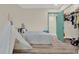 Bedroom features a teepee, furniture and hardwood floors at 9107 Bay Ne St, St Petersburg, FL 33702