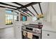 Modern kitchen with stainless steel appliances, and an open design connecting to the living space at 9107 Bay Ne St, St Petersburg, FL 33702