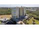 A high angle view of the condominium showcasing the lush nature preserve at 10851 Mangrove Cay Ne Ln # 714, St Petersburg, FL 33716
