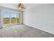 Spacious bedroom with sliding doors to the balcony offering great views at 10851 Mangrove Cay Ne Ln # 714, St Petersburg, FL 33716