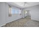 A bright bedroom features neutral walls, carpet floors, and a mirror closet at 10851 Mangrove Cay Ne Ln # 714, St Petersburg, FL 33716
