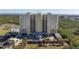 Beautiful condominium building showcasing covered parking and scenic waterfront views from many balconies at 10851 Mangrove Cay Ne Ln # 714, St Petersburg, FL 33716
