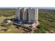 Stunning condominium building with ample parking and lush greenery, near waterfront views from many balconies at 10851 Mangrove Cay Ne Ln # 714, St Petersburg, FL 33716