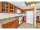 Well-equipped kitchen with granite countertops, stainless steel appliances, and ample cabinet space for storage at 10851 Mangrove Cay Ne Ln # 714, St Petersburg, FL 33716