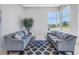 Comfortable lobby featuring cozy couches and a view of the outdoors at 10851 Mangrove Cay Ne Ln # 714, St Petersburg, FL 33716