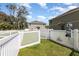 Community dog park with waste station, fencing, and green space for pets at 10924 Brightleaf Ct, Riverview, FL 33569