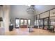 Bright lobby area with herringbone floors, high ceilings, modern lighting, and ample seating at 11135 E 65Th Ter, Palmetto, FL 34221