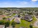 Beautiful aerial shot of a residential neighborhood with manicured lawns and tree-lined streets at 11225 Godwit Ct, New Port Richey, FL 34654