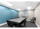Comfortable conference room with a large table, seating, and decor for productive discussions at 11225 Godwit Ct, New Port Richey, FL 34654