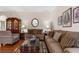 Relaxing living room with sofas, coffee table, and tasteful decor at 11225 Godwit Ct, New Port Richey, FL 34654