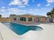 Backyard with a pool and patio offers an ideal outdoor space for entertaining and relaxing in a private, serene environment at 11549 48Th Ave N, St Petersburg, FL 33708