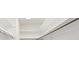 Organized white closet featuring shelving and hanging rods at 11549 48Th Ave N, St Petersburg, FL 33708