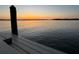 Beautiful sunset view from the wooden dock, highlighting serene waterfront living at 11549 48Th Ave N, St Petersburg, FL 33708
