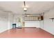 Garage with painted floor and built in cabinets at 11549 48Th Ave N, St Petersburg, FL 33708