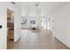 Bright, open-concept living room boasts tiled floors and ample space for dining and relaxing at 11549 48Th Ave N, St Petersburg, FL 33708