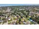Aerial view of the neighborhood, showcasing residential homes and tree-lined streets at 1165 63Rd S Ave, St Petersburg, FL 33705