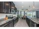 Beautiful kitchen with stainless steel appliances, granite countertops, and ample cabinet space at 12315 Dora Trail, Parrish, FL 34219