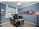 Inviting office space with large window, neutral carpet and tasteful decor at 12315 Dora Trail, Parrish, FL 34219